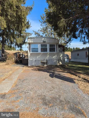 a view of a yard in front of a house