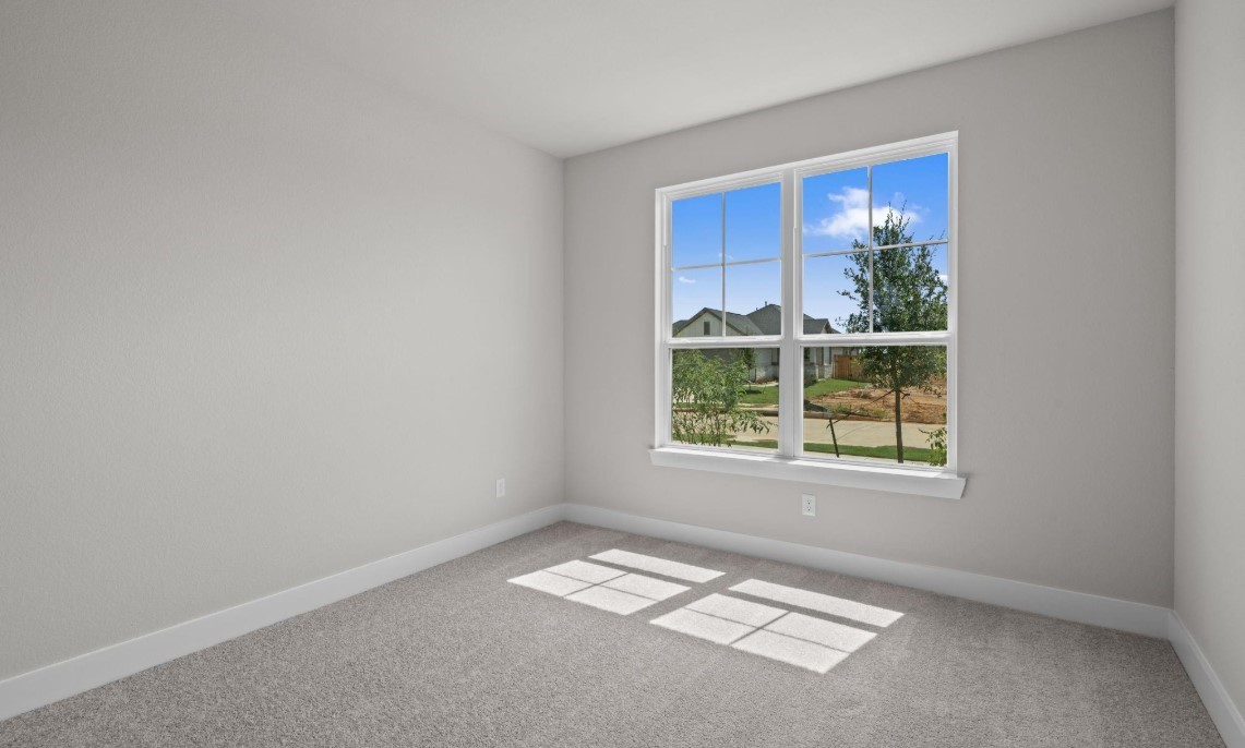325 Gambels Quail Road Hempstead, TX 77445 - Photo 13 of 21 an empty room with a window