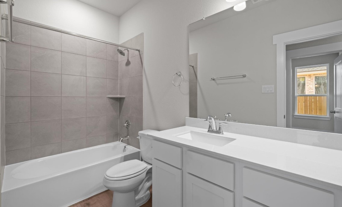 325 Gambels Quail Road Hempstead, TX 77445 - Photo 14 of 21 a bathroom with a sink toilet and shower