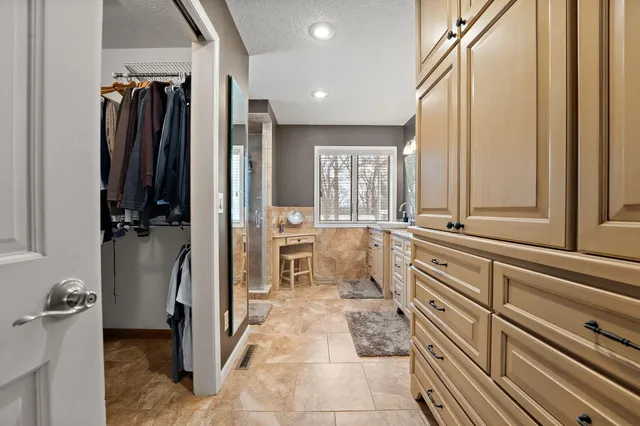 a bathroom with a tub and a sink