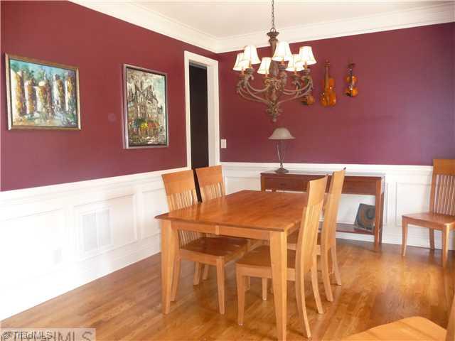 8914 Grove Park Drive Oak Ridge, NC 27310 - Photo 7 of 16 Dining Room. Large formal dining room perfect for family meals or a family night of fun & board games.