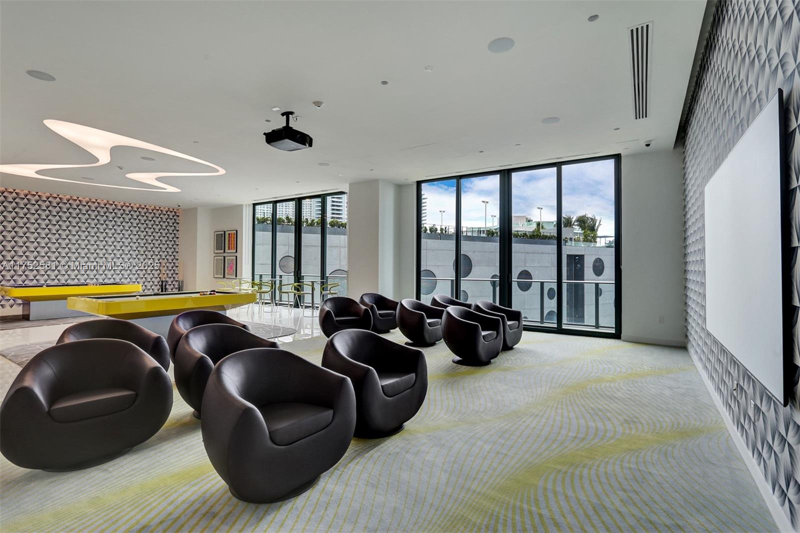 501 Northeast 31st Street, Unit 910 Miami, FL 33137 - Photo 44 of 84 a living room with furniture ceiling fan and a large window