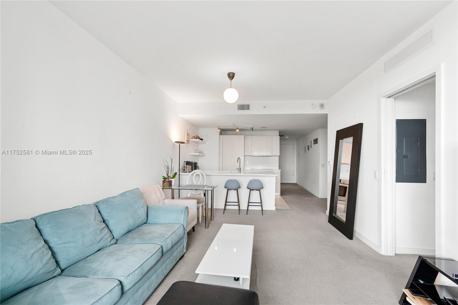 501 Northeast 31st Street, Unit 910 Miami, FL 33137 - Photo 83 of 84 a living room with furniture and a window