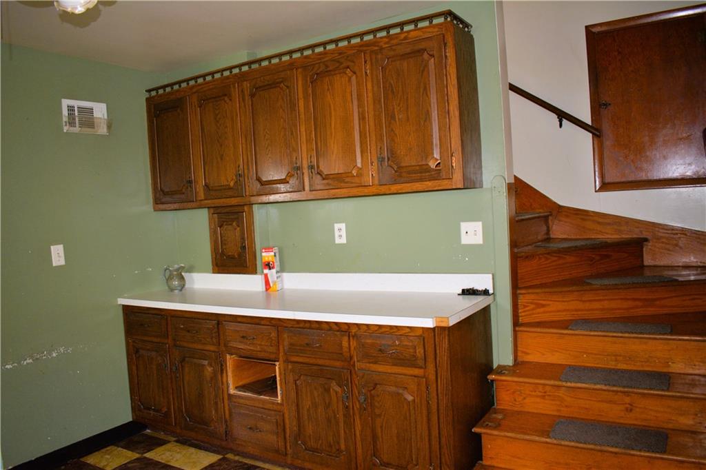 371 Main Street Leechburg, PA 15656 - Photo 8 of 24 a kitchen with a sink and a mirror