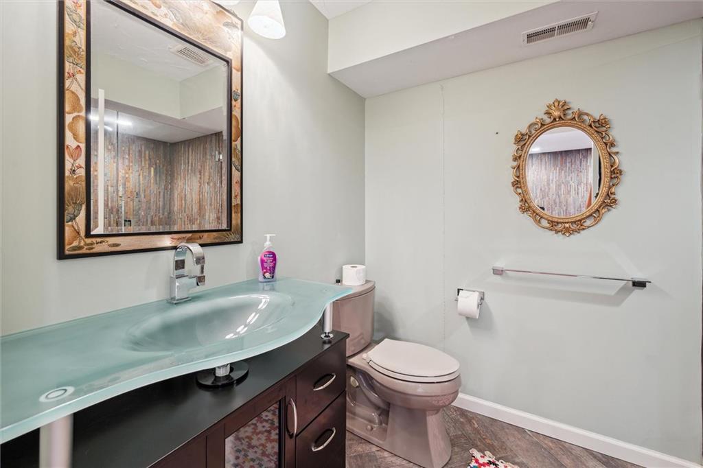 136 Park Place McKees Rocks, PA 15136 - Photo 43 of 49 a bathroom with a sink and a mirror