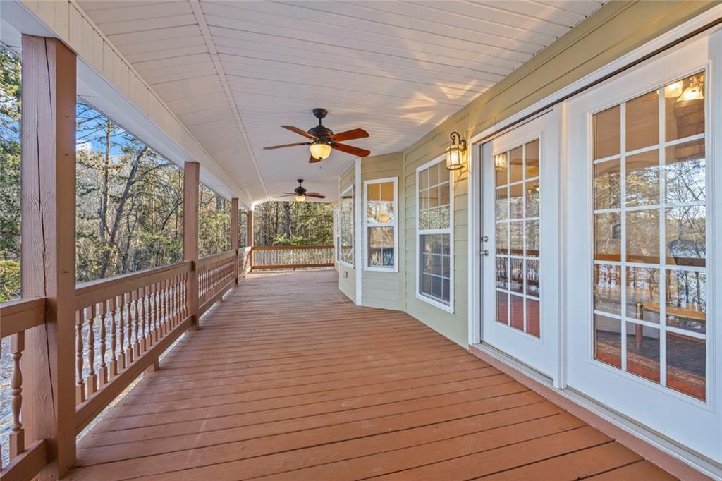 80 Hardy Farms Point Martin, GA 30557 - Photo 26 of 84 a view of a porch with wooden floor and iron stairs