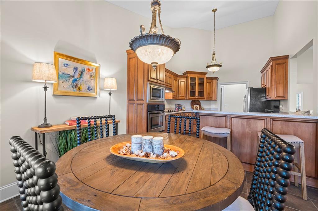 80 Hardy Farms Point Martin, GA 30557 - Photo 31 of 84 a dining room with furniture a rug and wooden floor