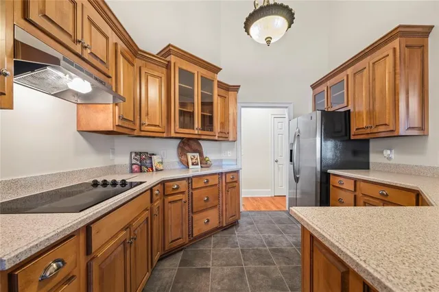 a bathroom with a sink toilet vanity and shower
