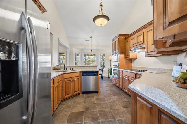 a living room with furniture a ceiling fan and a rug