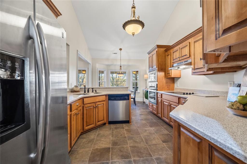 80 Hardy Farms Point Martin, GA 30557 - Photo 37 of 84 a kitchen with stainless steel appliances granite countertop a sink a stove and a refrigerator