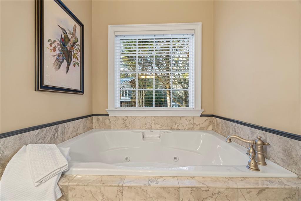 80 Hardy Farms Point Martin, GA 30557 - Photo 44 of 84 a white bath tub sitting next to a window