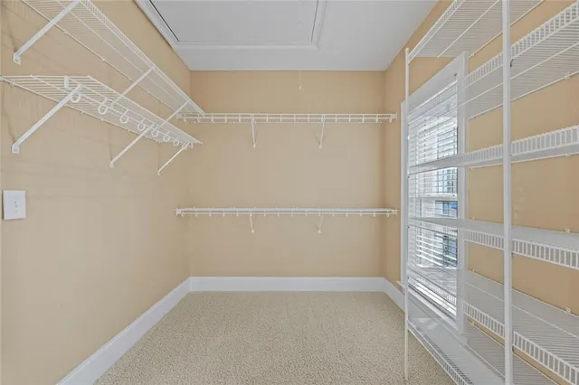 a view of porch with a table and chairs