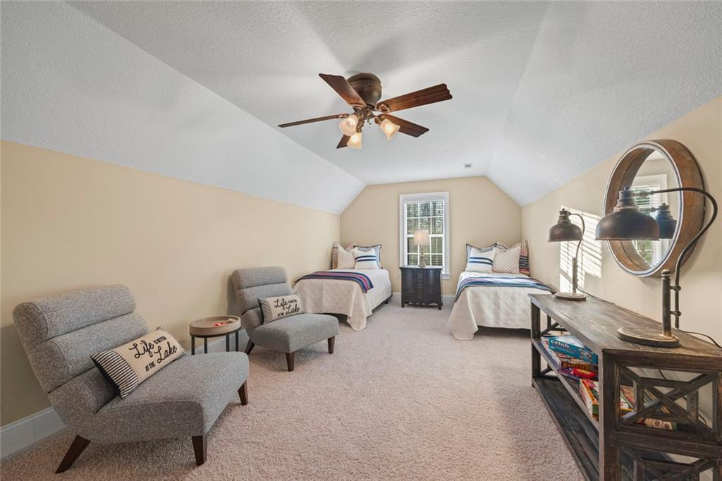 80 Hardy Farms Point Martin, GA 30557 - Photo 59 of 84 a living room with furniture a ceiling fan and a rug