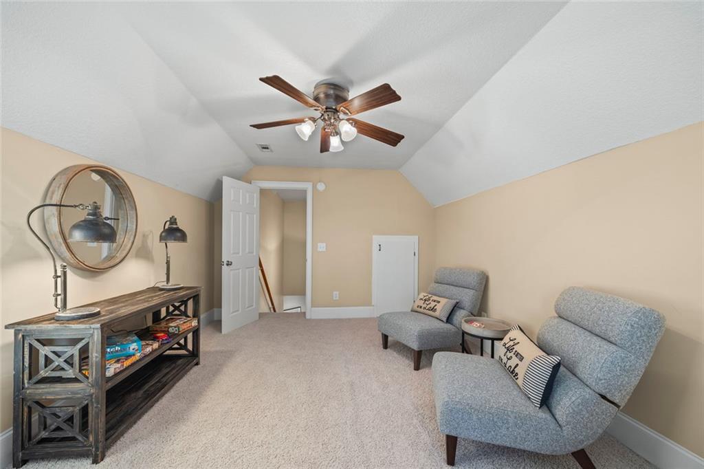 80 Hardy Farms Point Martin, GA 30557 - Photo 60 of 84 a living room with furniture and a chandelier