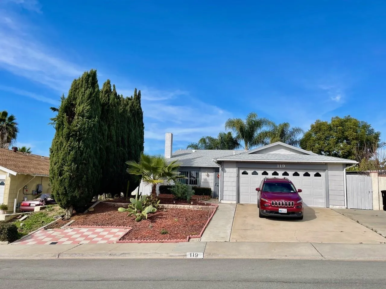 119 Linaza Lane Spring Valley, CA 91977 - Photo 1 of 36 a car parked in front of house