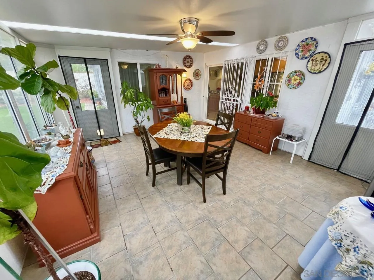 119 Linaza Lane Spring Valley, CA 91977 - Photo 12 of 36 a living room with furniture and a large window