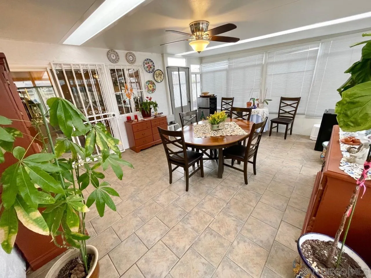 119 Linaza Lane Spring Valley, CA 91977 - Photo 13 of 36 a view of a dining room with furniture