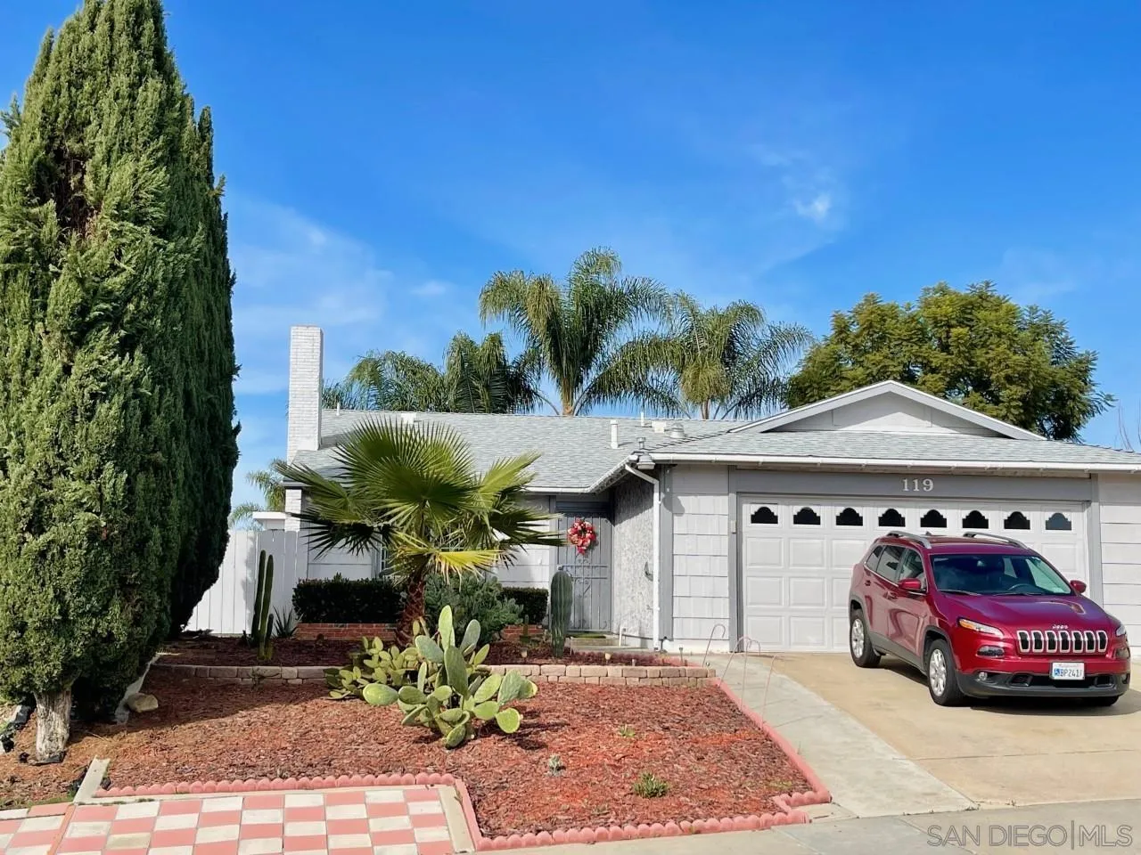 119 Linaza Lane Spring Valley, CA 91977 - Photo 2 of 36 a front view of a house with a yard