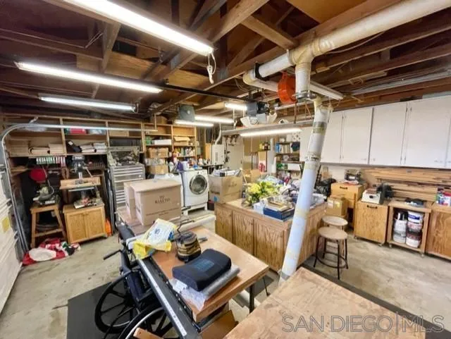119 Linaza Lane Spring Valley, CA 91977 - Photo 24 of 36 a view of a storage room with washer and dryer