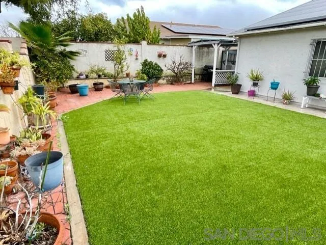 119 Linaza Lane Spring Valley, CA 91977 - Photo 25 of 36 a view of a backyard with a patio