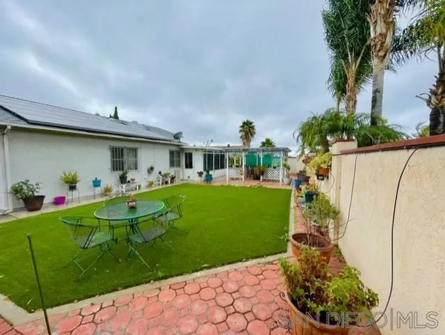 119 Linaza Lane Spring Valley, CA 91977 - Photo 27 of 36 a front view of a house with garden