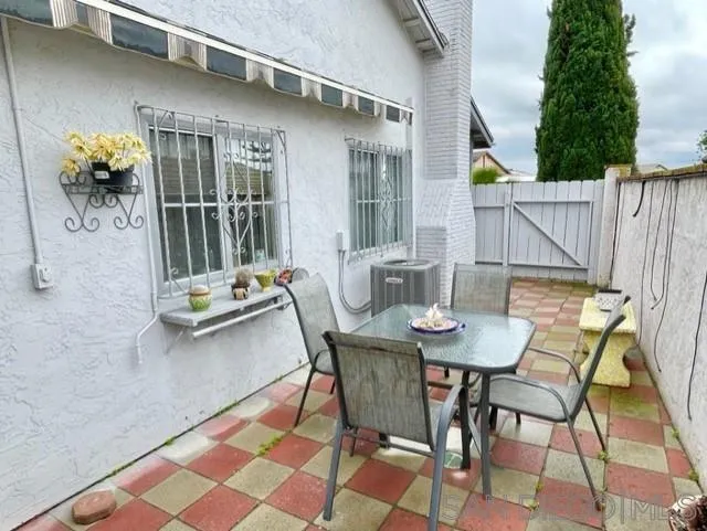 119 Linaza Lane Spring Valley, CA 91977 - Photo 29 of 36 a balcony with table and chairs