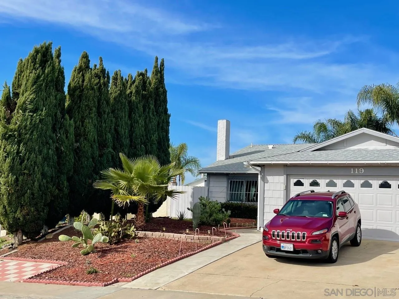119 Linaza Lane Spring Valley, CA 91977 - Photo 3 of 36 a front view of a house with a yard