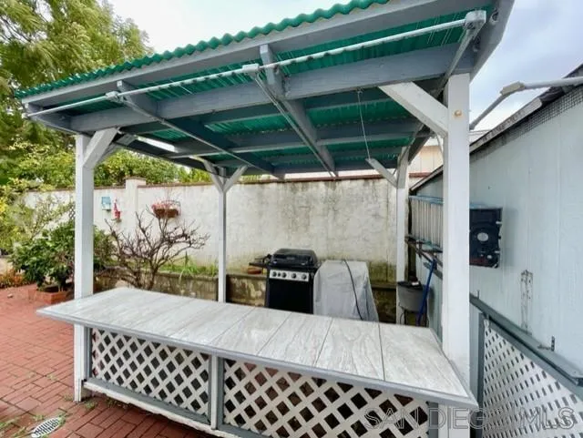 119 Linaza Lane Spring Valley, CA 91977 - Photo 31 of 36 a view of a patio with table and chairs