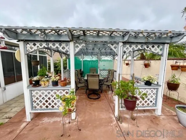 119 Linaza Lane Spring Valley, CA 91977 - Photo 33 of 36 a view of a chairs and table in a patio