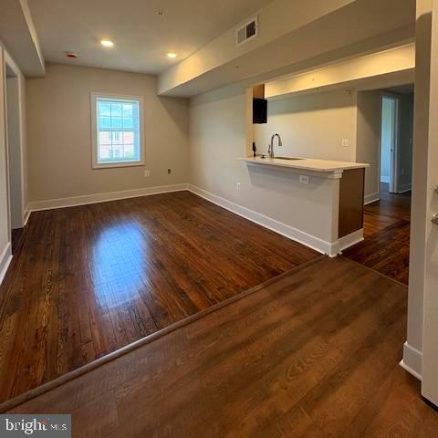202 Princess Anne Street Fredericksburg, VA 22401 - Photo 3 of 6 an empty room with wooden floor and windows