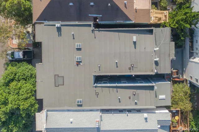 a view of a street with garage