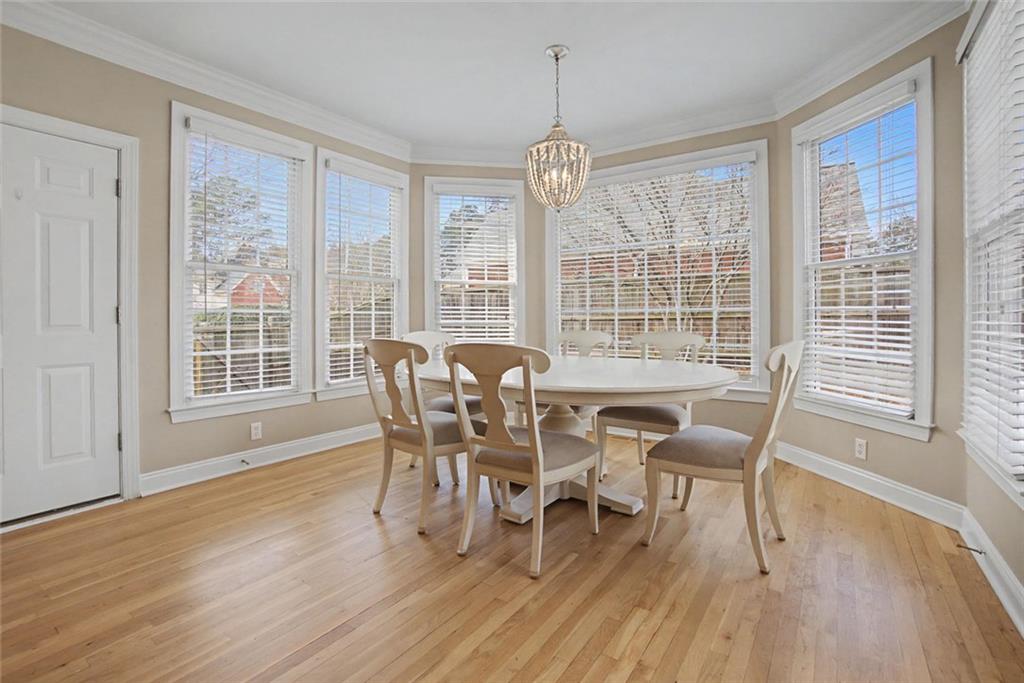 2018 Cockrell Pointe Northwest Kennesaw, GA 30152 - Photo 12 of 51 a dining room with furniture window wooden floor