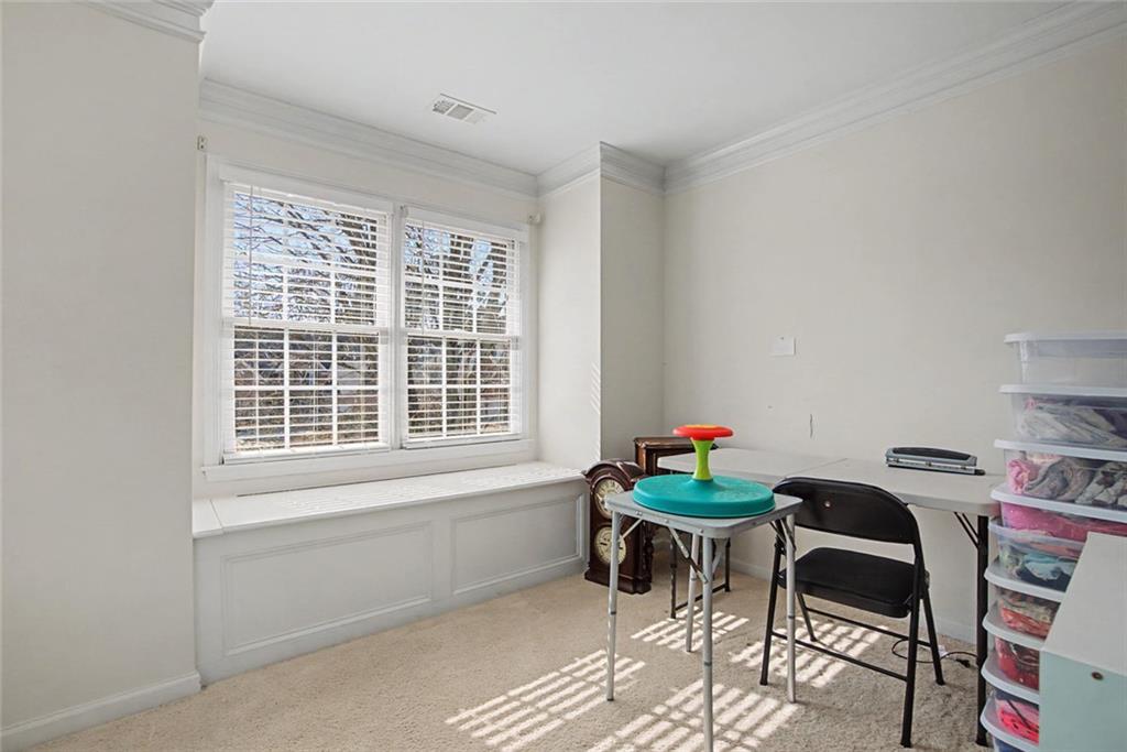 2018 Cockrell Pointe Northwest Kennesaw, GA 30152 - Photo 20 of 51 a livingroom with furniture and a window