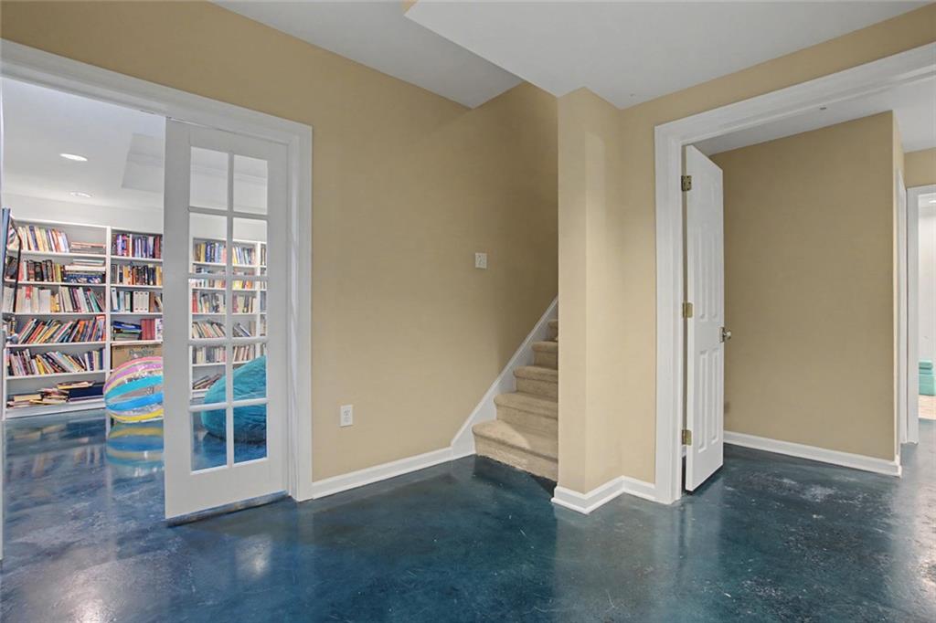 2018 Cockrell Pointe Northwest Kennesaw, GA 30152 - Photo 28 of 51 a view of a hallway with wooden floor and entryway