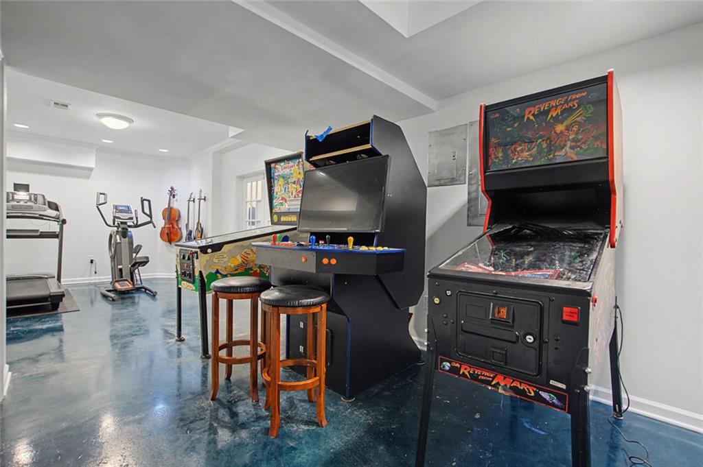 2018 Cockrell Pointe Northwest Kennesaw, GA 30152 - Photo 31 of 51 a dining room with furniture and wooden floor