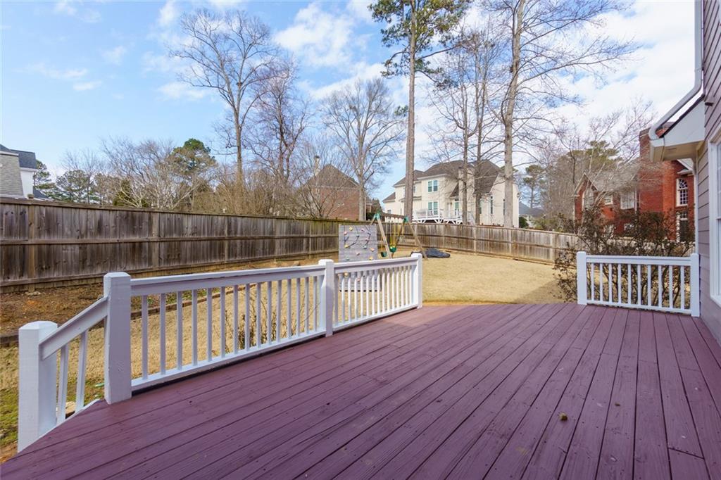 2018 Cockrell Pointe Northwest Kennesaw, GA 30152 - Photo 36 of 51 a view of a house with a deck
