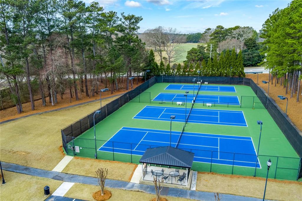 2018 Cockrell Pointe Northwest Kennesaw, GA 30152 - Photo 44 of 51 a view of yard from deck with patio
