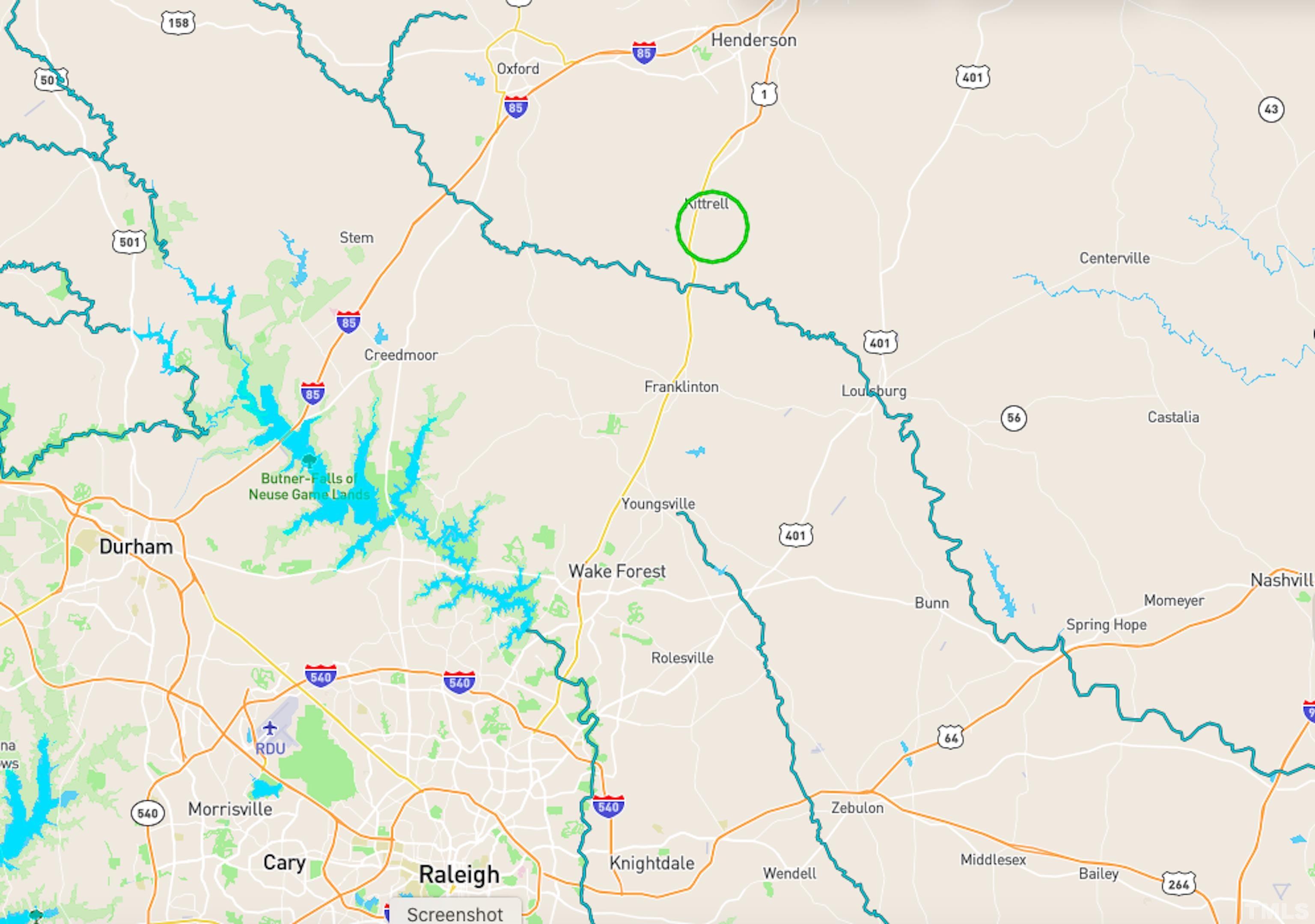 5-acres South Chavis Road Kittrell, NC 27544 - Photo 25 of 25 a white vase of flowers sitting on a table