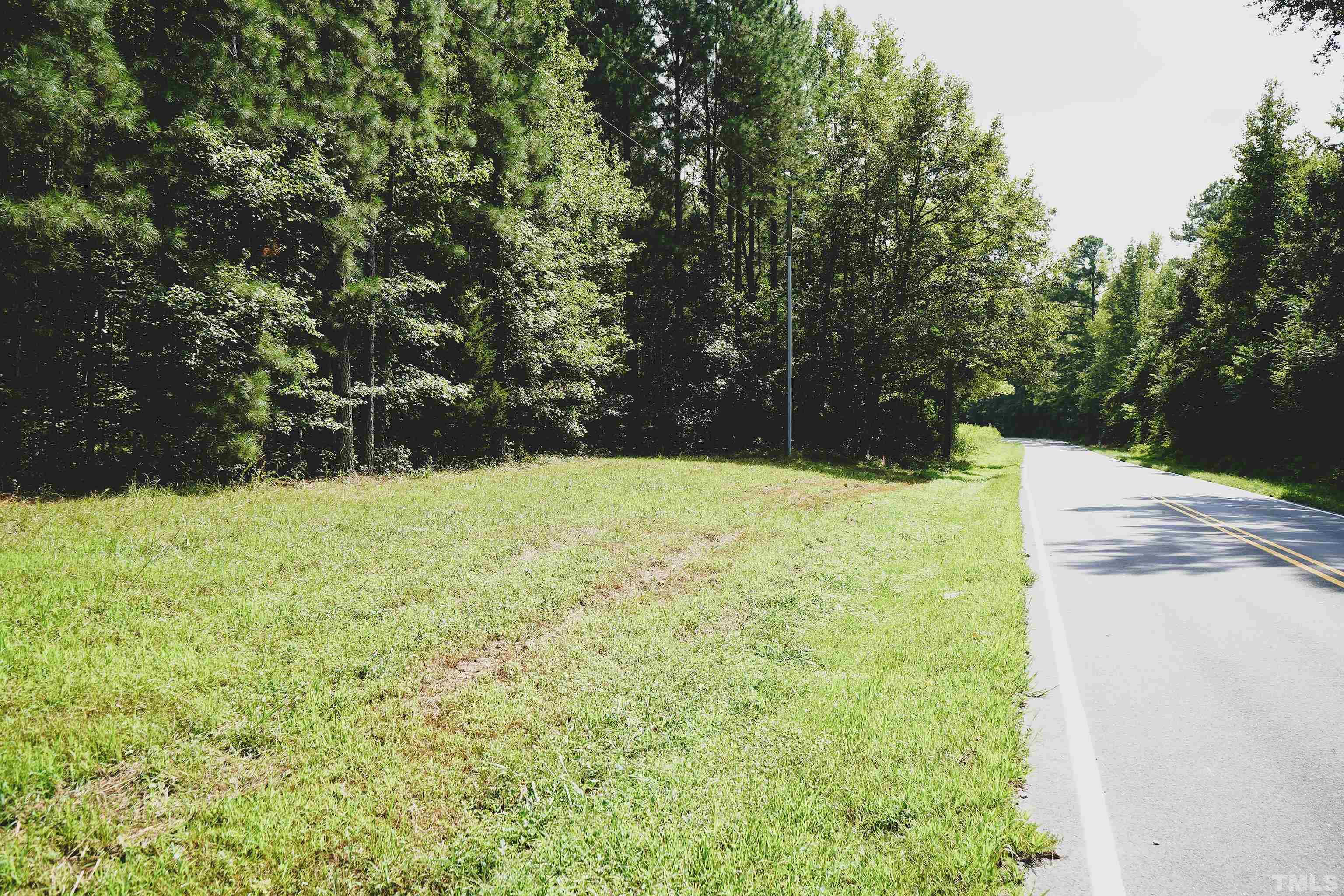 5-acres South Chavis Road Kittrell, NC 27544 - Photo 3 of 25 a view of white house with a yard