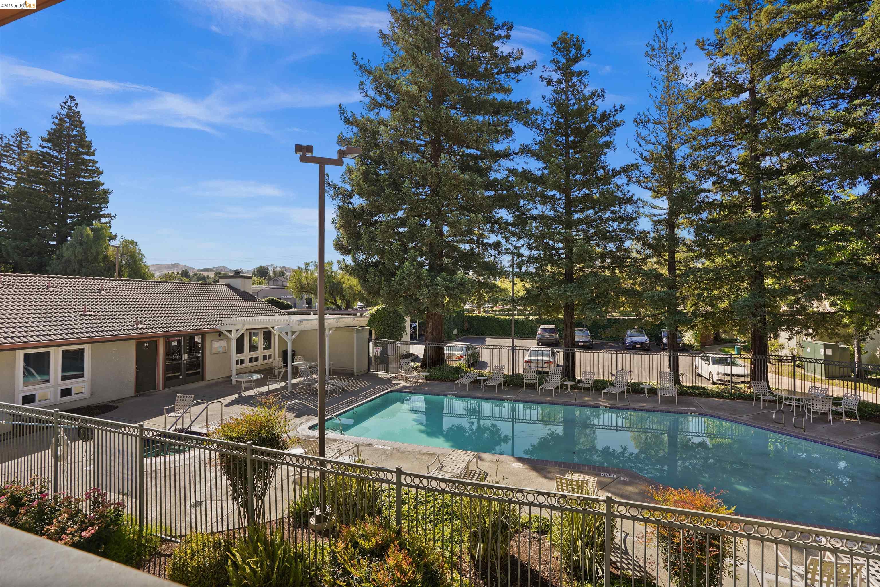 1505 Kirker Pass Road, Unit 214 Concord, CA 94521 - Photo 46 of 55 Outdoor swimming pool surrounded by a paved patio area