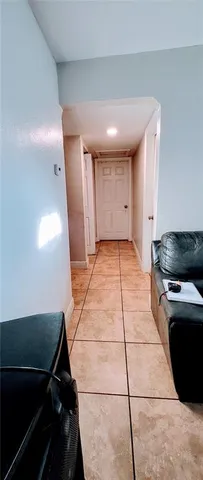a view of a kitchen with a sink and dishwasher stove