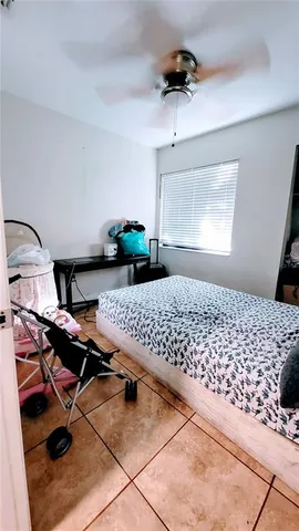a bedroom with furniture
