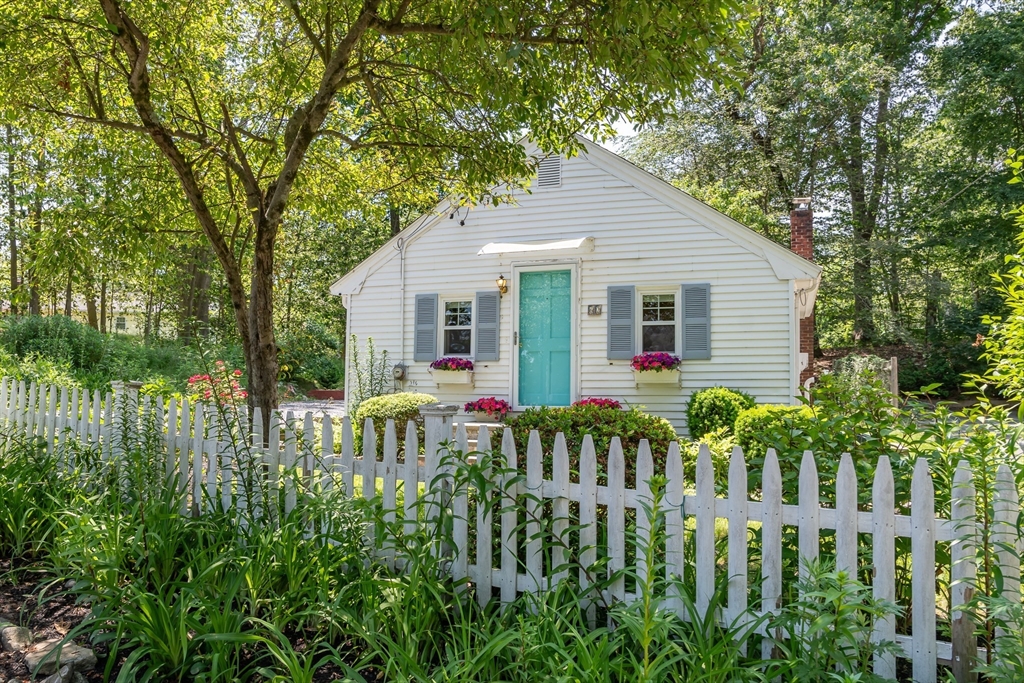 62 Sycamore Road Wayland, MA 01778 - Photo 1 of 16 a house view with a garden space