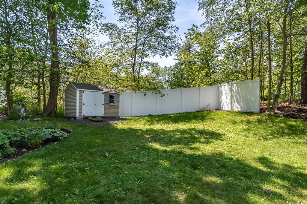 62 Sycamore Road Wayland, MA 01778 - Photo 15 of 16 a view of a backyard