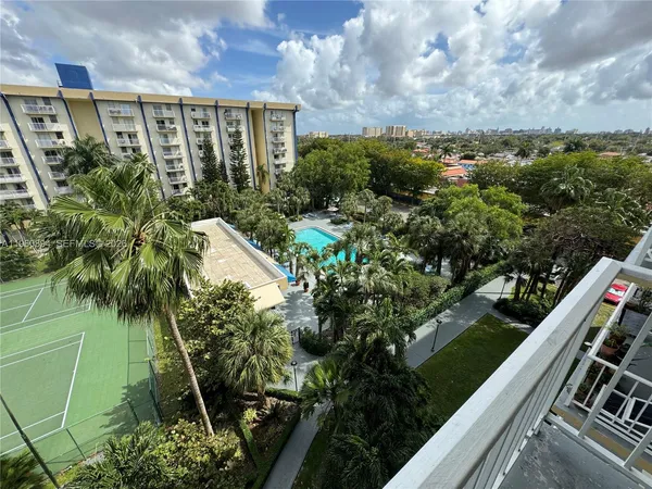 a view of a refrigerator in kitchen