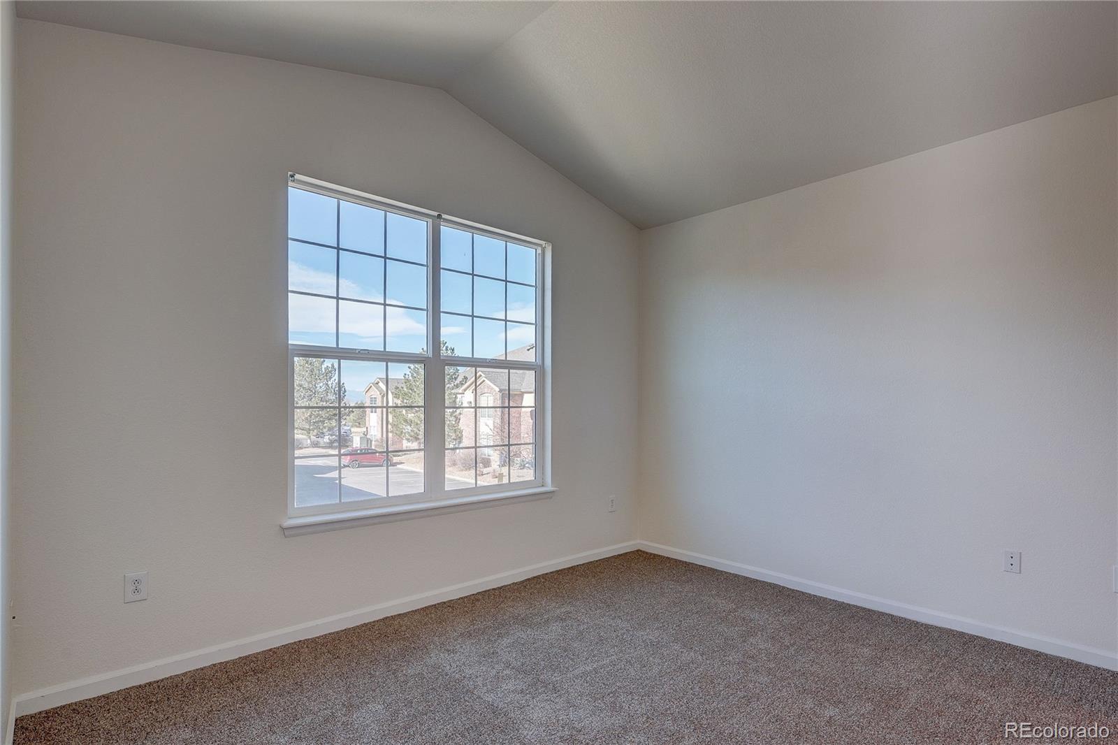 5756 North Genoa Way, Unit 12208 Aurora, CO 80019 - Photo 17 of 33 an empty room with a window