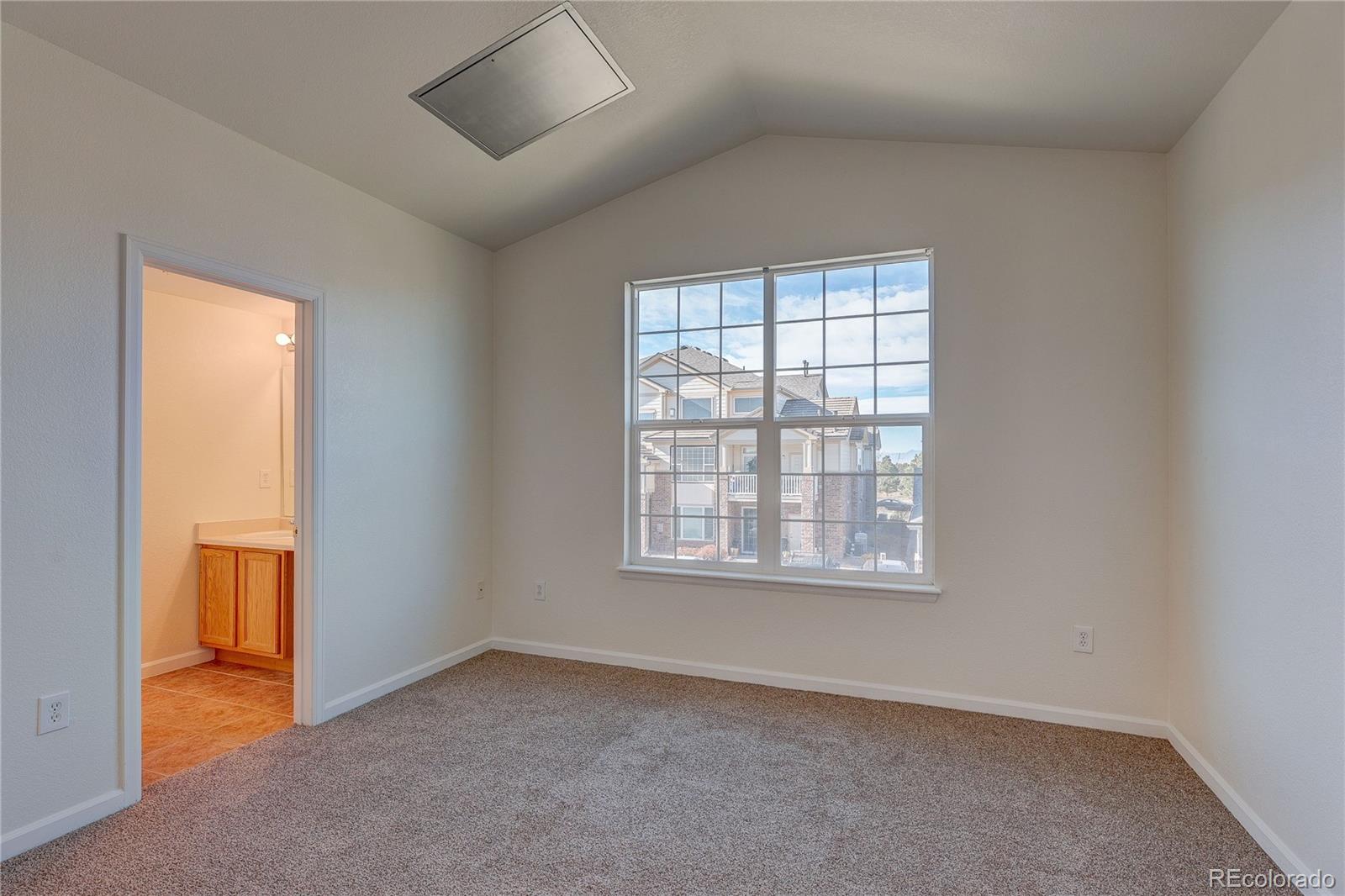 5756 North Genoa Way, Unit 12208 Aurora, CO 80019 - Photo 18 of 33 an empty room with a window