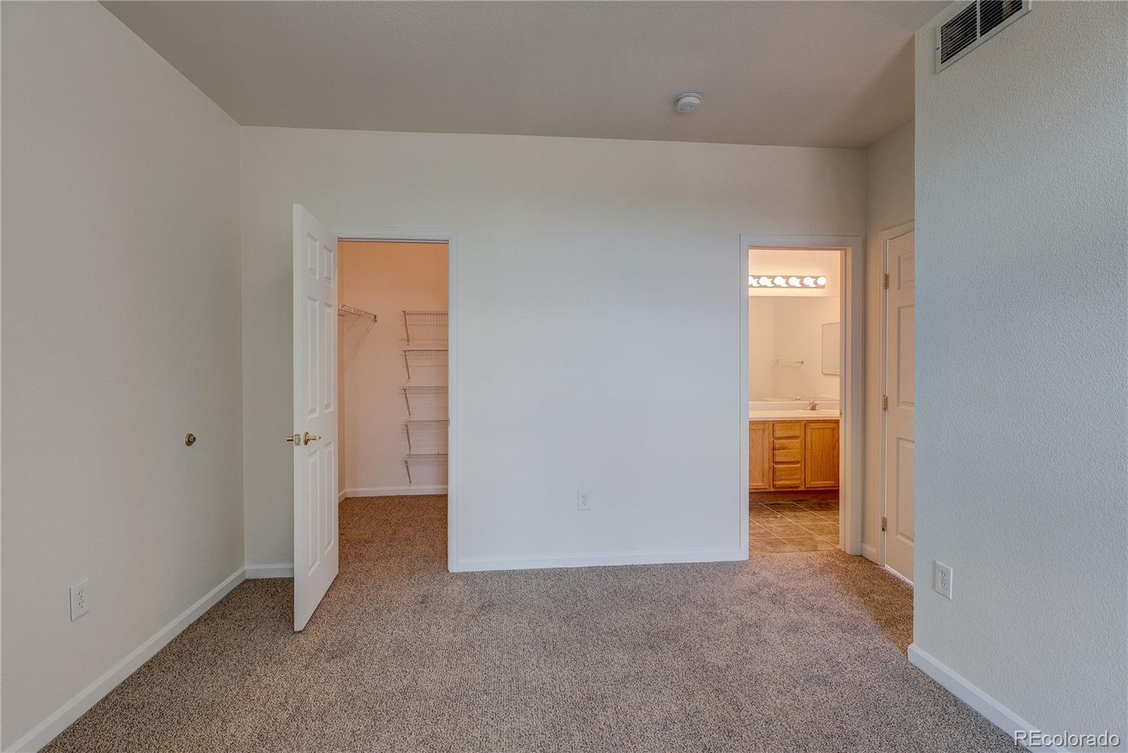 5756 North Genoa Way, Unit 12208 Aurora, CO 80019 - Photo 24 of 33 a view of an empty room