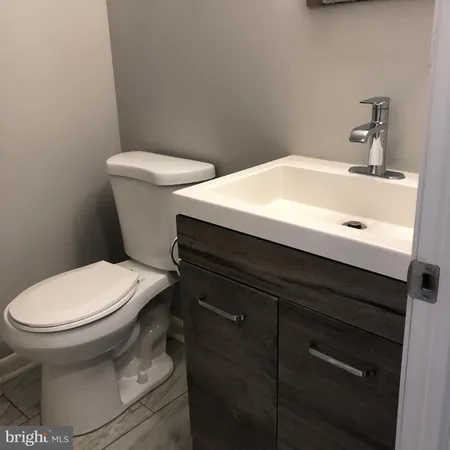 a bathroom with a sink and a toilet