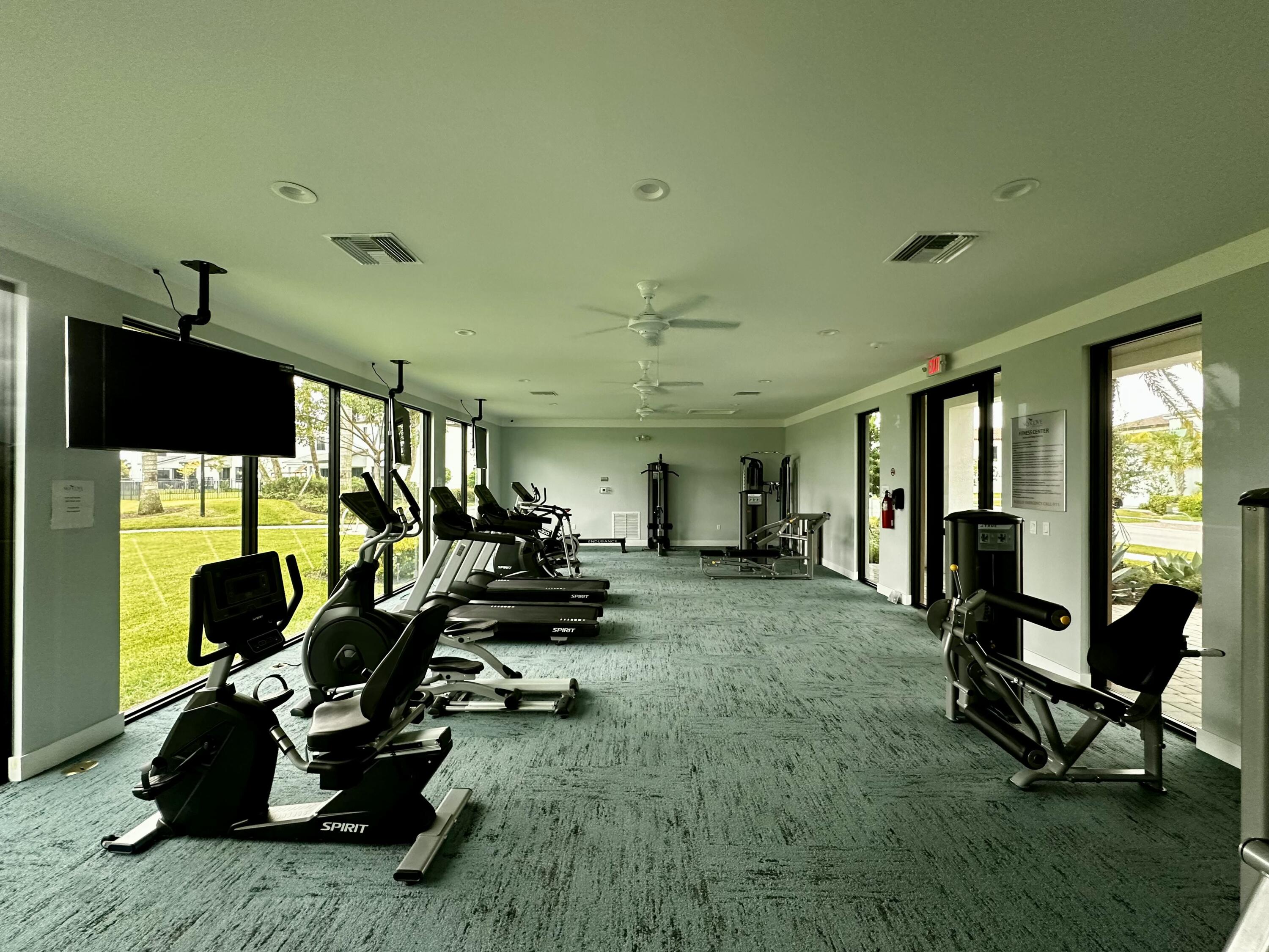 5570 Quiet Lake Place Westlake, FL 33470 - Photo 16 of 18 a view of a livingroom with workspace and a window
